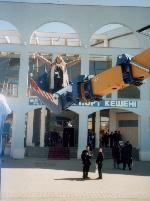 увеличить